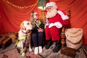girl with vision impairment at accessible guide dog christmas grotto