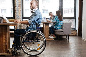 Man working in a job with a disability